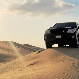 Veranstaltung: Sunset Desert Safari: Quad Bike, Sandboarding, Camel Ride + BBQ Dinner, Dubai Desert Safari in Dubai